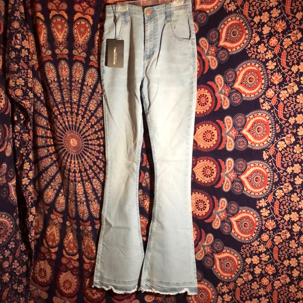 Brand new light wash flared mid waist jeans